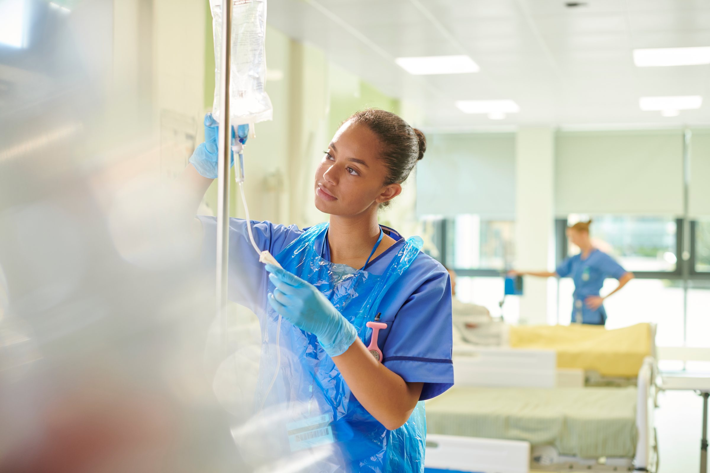 Infusion care team preparing for patient treatment